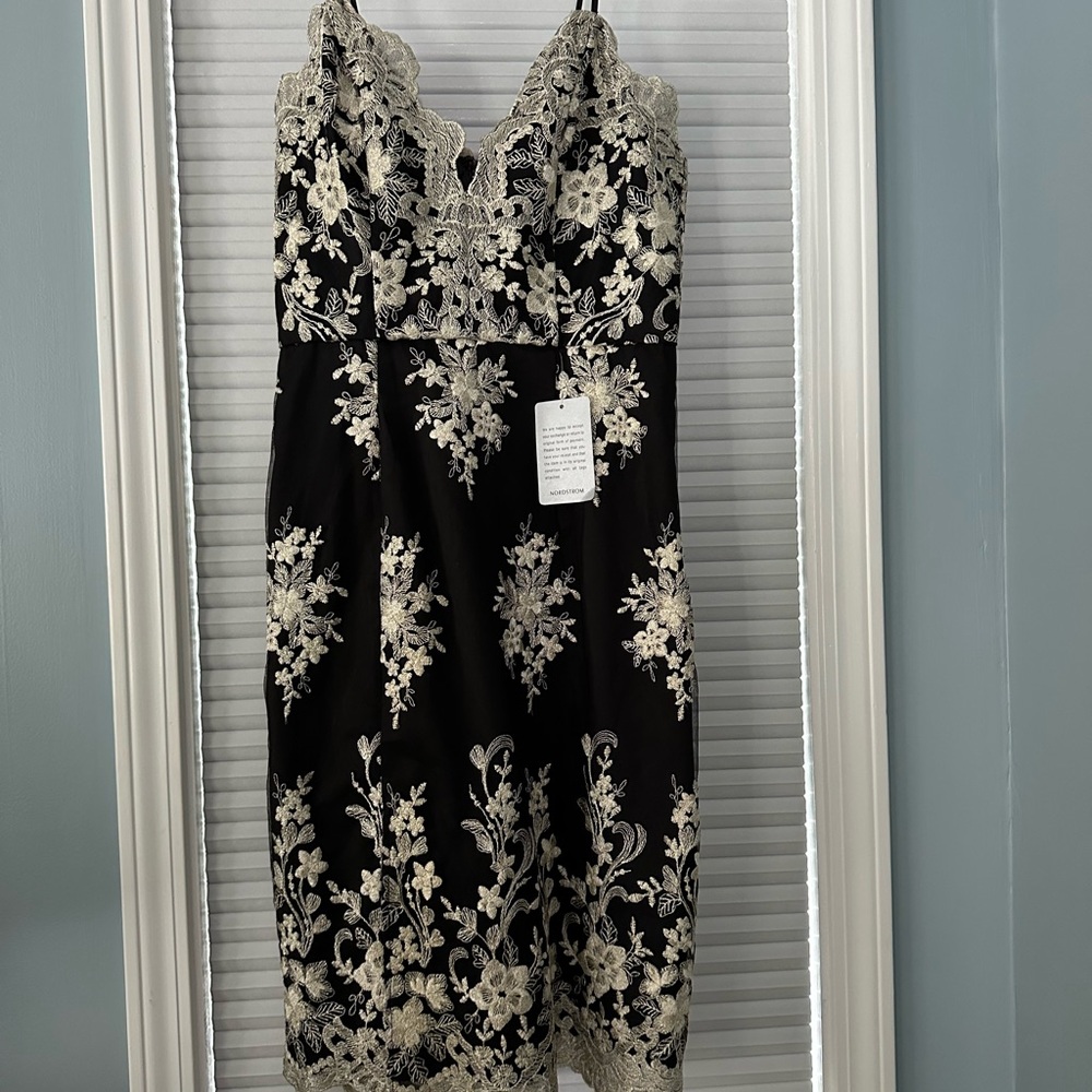 Elegant Black and Cream Lace Dress